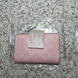 Coach Medium Corner Zip Wallet In Signature Canvas (Powder pink)